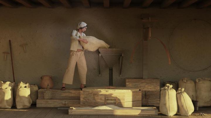 Imagen 3D que ilustra un trabajador vertiendo los granos a la maquinaria para su molienda. 
